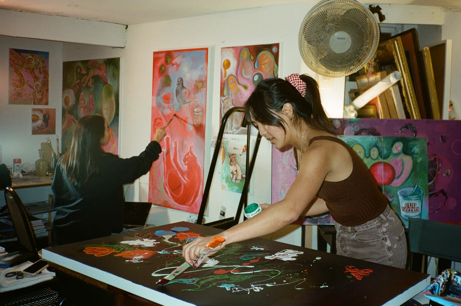 Residents painting together in Soup Studio