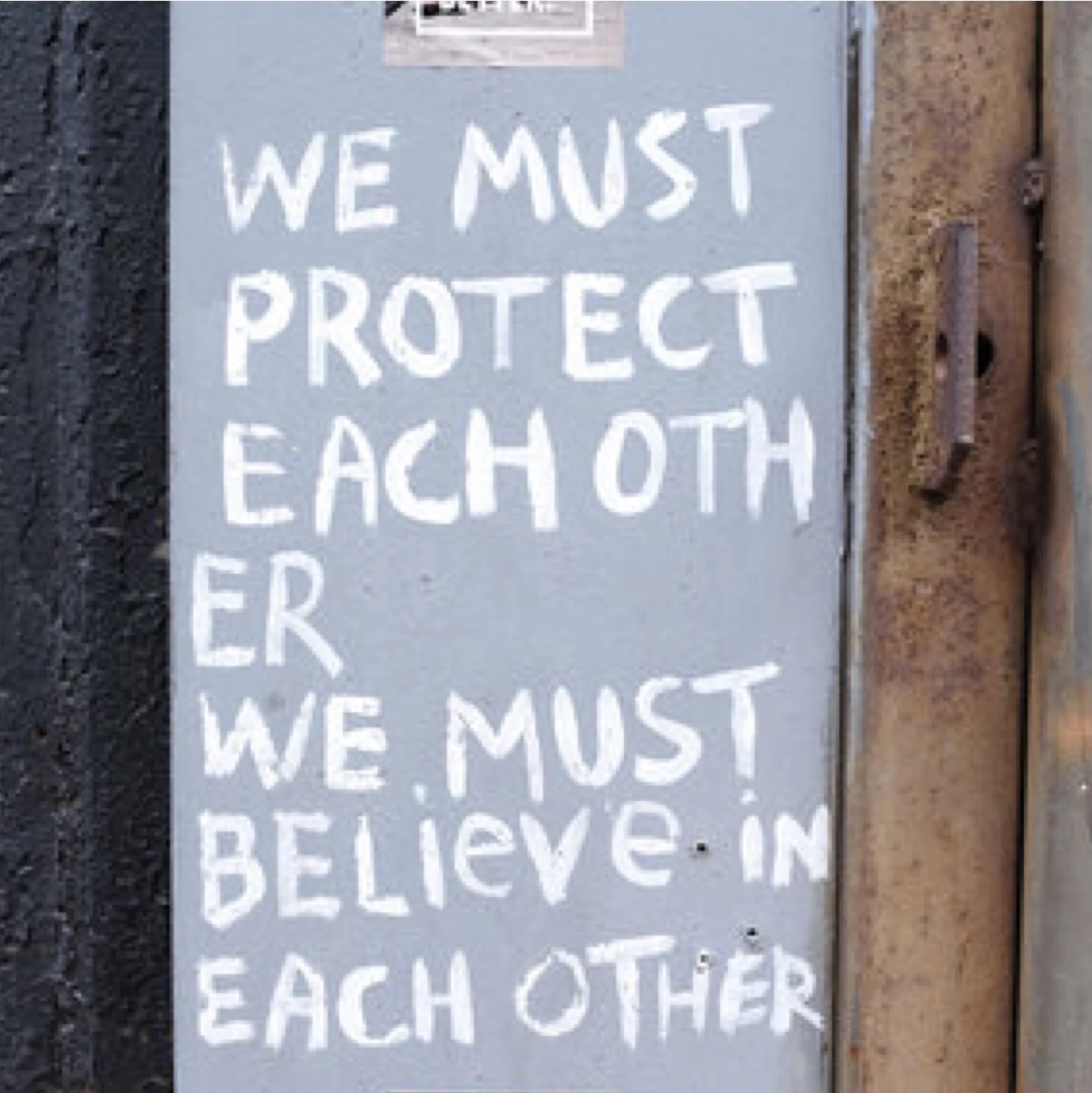 Chalk message: We must protect each other, we must believe in each other